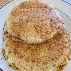 Atlantis Restaurant - Pancakes with cinnamon sprinkled on top.
