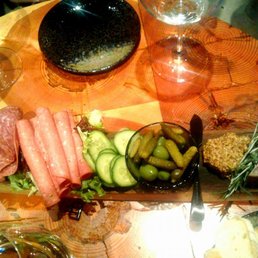 Salami, baloney, cucumbers, pickles, olives and pheasant pate.