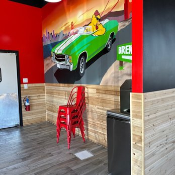 Angry Chickz - a green car and red chairs - Chicken Shop Near Me - Brentwood, California Angry Chickz - a green car and red chairs - Chicken Shop Near Me - Brentwood, California