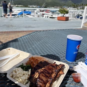 Kim's Korean Bar-B-Q - Picnic tables next to restaurant - Korean Near Me - Honolulu, Hawaii Kim's Korean Bar-B-Q - Picnic tables next to restaurant - Korean Near Me - Honolulu, Hawaii
