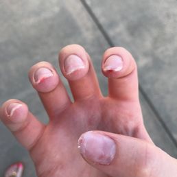 This is how they looked leaving this place... You can see previous nail color not removed, my nails all cut up and uneven.