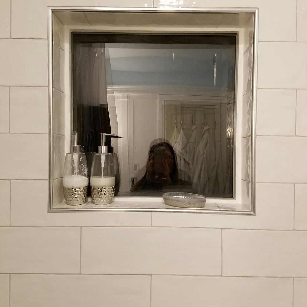 Tony Tran Construction - Note how perfectly symmetrical thw tiles frame the window - General Contractors Near Me Tony Tran Construction - Note how perfectly symmetrical thw tiles frame the window - General Contractors Near Me
