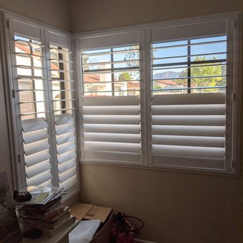 Discount Shutters and Blinds - Halfway open in guest bedroom - Shades & Blinds Near Me - Simi Valley, California Discount Shutters and Blinds - Halfway open in guest bedroom - Shades & Blinds Near Me - Simi Valley, California