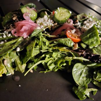 VAGA Restaurant & Bar - green salad (served on one side of a plate) - Latin American Near Me - Encinitas, California VAGA Restaurant & Bar - green salad (served on one side of a plate) - Latin American Near Me - Encinitas, California