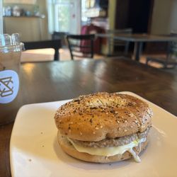 Salt City Coffee - Breakfast sandwich with sriracha mayo. 16 oz cold brew with maple and almond milk.