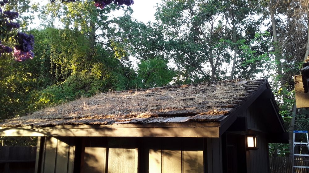 Slide of Quinn Bro's Roofing