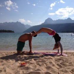 YogaSix - Meridian - Practicing on the beach at Redfish