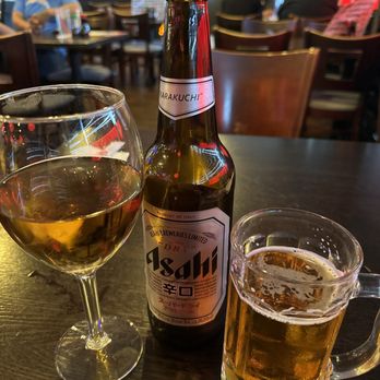 Oishii Sushi - a glass of wine and a bottle of beer - Sushi Bars Near Me - Riverside, California Oishii Sushi - a glass of wine and a bottle of beer - Sushi Bars Near Me - Riverside, California