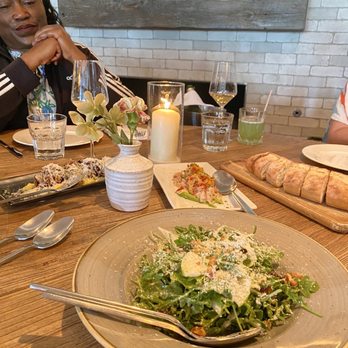 Nella Kitchen & Bar - A lovely Arugula salad w/ dates, goat cheese, pecans, apples, etc... - American Near Me - Los Olivos, California Nella Kitchen & Bar - A lovely Arugula salad w/ dates, goat cheese, pecans, apples, etc... - American Near Me - Los Olivos, California