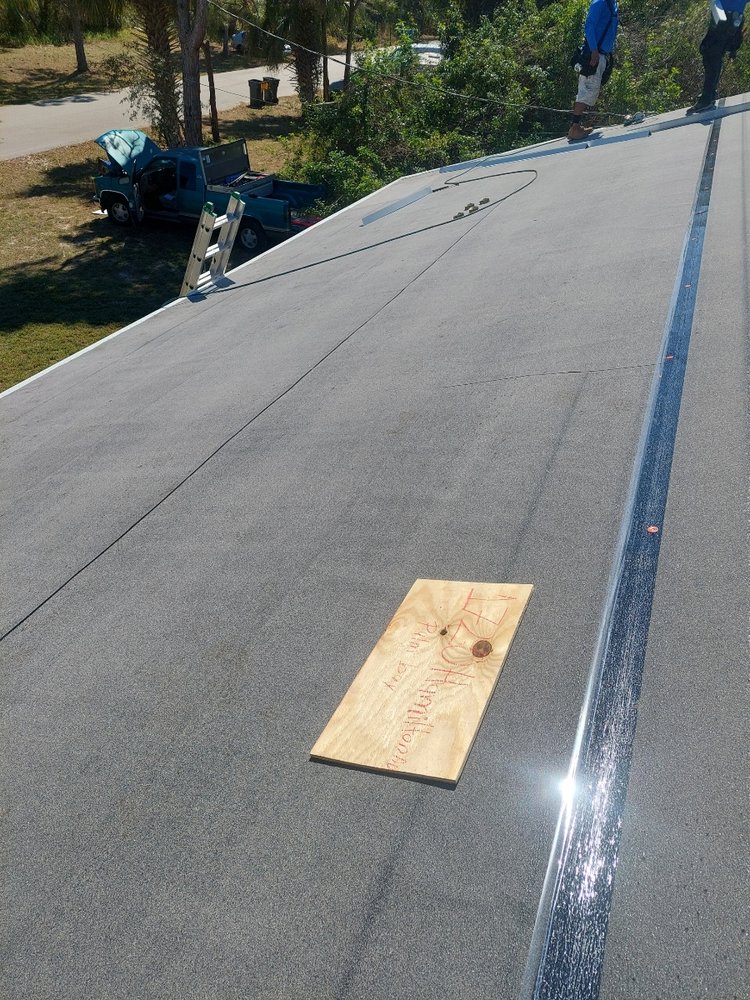 Slide of KJ Miller Roofing