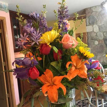 Nature's Gift Flower Shop - First one sent - horrible! Dying orange lilies, not featured in the selected arrangement online - Florists Near Me - Voorhees, New Jersey
