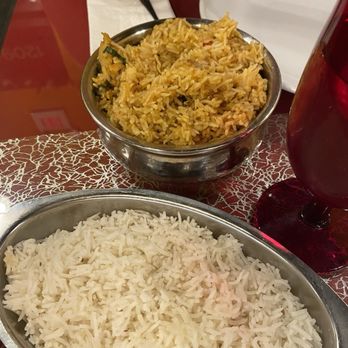 Clay Oven Indian Cuisine - Top: chicken biryani. Bottom: jasmine rice - Indian Near Me - Saint Joseph, Missouri Clay Oven Indian Cuisine - Top: chicken biryani. Bottom: jasmine rice - Indian Near Me - Saint Joseph, Missouri