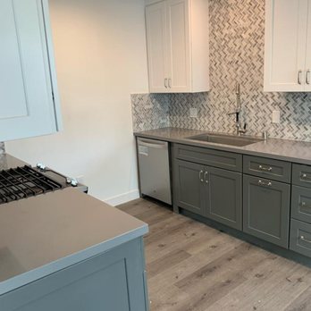 Pure Energy Construction - This is our after kitchen featuring greys and whites. Our grey quartz countertops are pretty amazing! - General Contractors Near Me - Northridge, California Pure Energy Construction - This is our after kitchen featuring greys and whites. Our grey quartz countertops are pretty amazing! - General Contractors Near Me - Northridge, California