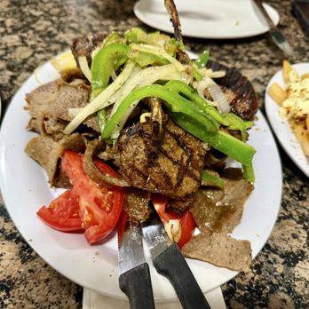 Chris' Taverna - Meat Platter with Regular and Greek Fries! - Greek Near Me - Lake Worth, Florida Chris' Taverna - Meat Platter with Regular and Greek Fries! - Greek Near Me - Lake Worth, Florida