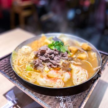 Tasty Pot - a bowl of soup with meat and vegetables - Hot Pot Near Me - Glendale, Arizona
