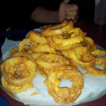Texas Borders Bar & Grill - got halfway through these splendiforous o rings.....before we remembered to snap a pic - American Near Me - Katy, Texas
