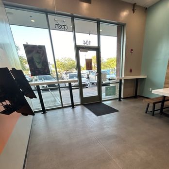 Robeks Fresh Juices & Smoothies - Entrance, from inside showing the counters. You can see the edge of one table they have as well - Juice Bars & Smoothies Near Me - Mesa, Arizona Robeks Fresh Juices & Smoothies - Entrance, from inside showing the counters. You can see the edge of one table they have as well - Juice Bars & Smoothies Near Me - Mesa, Arizona
