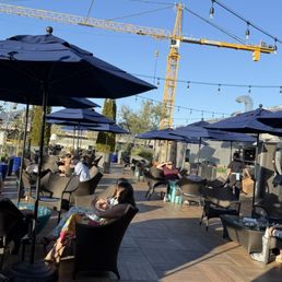 Outdoor seating with construction view Outdoor seating with construction view