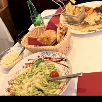 La Casa Nostra - Angus stake on peppercorn sauce and pasta with fresh made pesto sauce and home made bread - Italian Near Me - Geneva, GE La Casa Nostra - Angus stake on peppercorn sauce and pasta with fresh made pesto sauce and home made bread - Italian Near Me - Geneva, GE