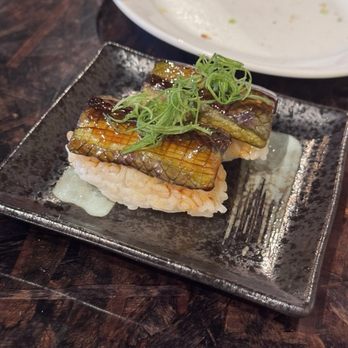 XO Restaurant - Eggplant nigiri (part of the vegetarian menu) - Asian Fusion Near Me - Honolulu, Hawaii XO Restaurant - Eggplant nigiri (part of the vegetarian menu) - Asian Fusion Near Me - Honolulu, Hawaii