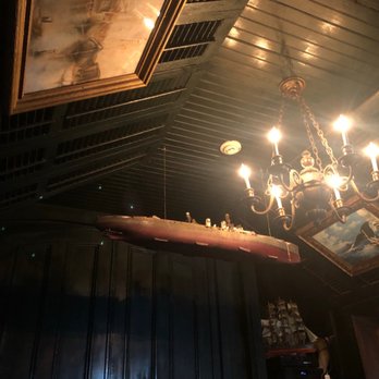 The Boat House - a chandelier hanging from the ceiling - Bars Near Me - Lambertville, New Jersey The Boat House - a chandelier hanging from the ceiling - Bars Near Me - Lambertville, New Jersey