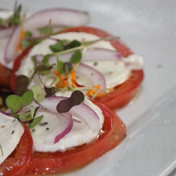 The Phoenix Steakhouse - a plate of tomatoes and onions - Steakhouses Near Me - Vernon, British Columbia The Phoenix Steakhouse - a plate of tomatoes and onions - Steakhouses Near Me - Vernon, British Columbia