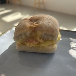 The Gathering Grounds - Egg and bacon biscuit sandwich