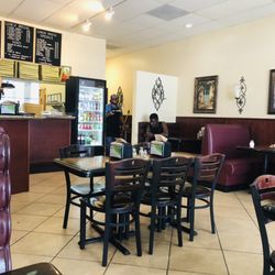 Rudi’s Pizza - Booths and tables inside