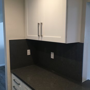 Future Vision Remodeling - Useful cabinets and countertop replace a clunky pantry clutter-magnet.  "Can you do that?" - the answer was "sure!" - General Contractors Near Me - San Jose, California