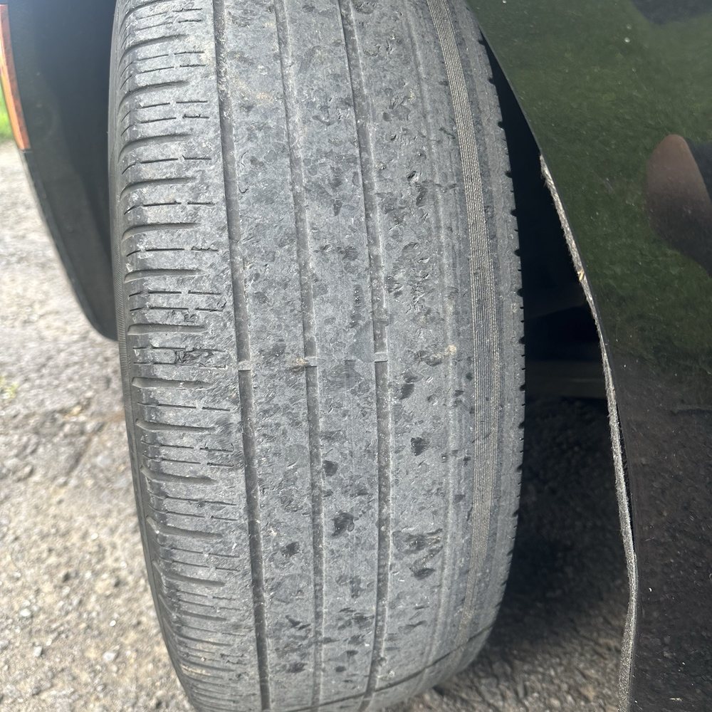 Avis Rent A Car - Driver front tire - Car Rental Near Me - New York, New York Avis Rent A Car - Driver front tire - Car Rental Near Me - New York, New York