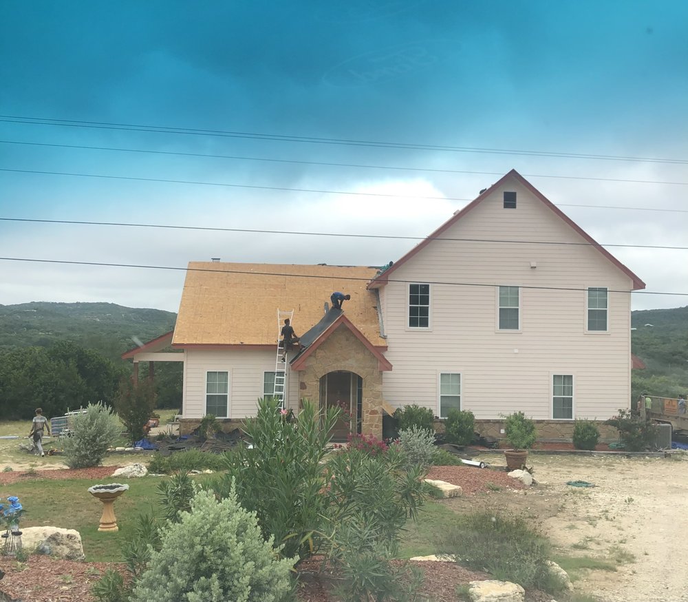 Slide of Pioneer Roof Pros