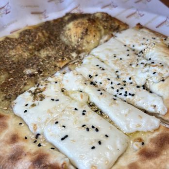 Zait & Zaatar - Combo cheese and Zaatar & Cheese Pie (Open, Dozen) - Mediterranean Near Me - Anaheim, California Zait & Zaatar - Combo cheese and Zaatar & Cheese Pie (Open, Dozen) - Mediterranean Near Me - Anaheim, California