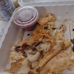Highland House Cafe & Carry Out - Undercooked. Middle was doughy. Mainly ate the toppings inside. Who taught them how to cook these. I've had them better from years before.