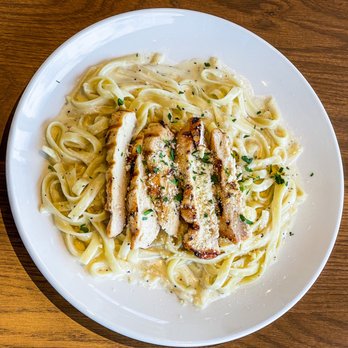 Emma Elle's Italian Kitchen - Fettuccine Alfredo with grilled chicken - Italian Near Me - Yukon, Oklahoma Emma Elle's Italian Kitchen - Fettuccine Alfredo with grilled chicken - Italian Near Me - Yukon, Oklahoma
