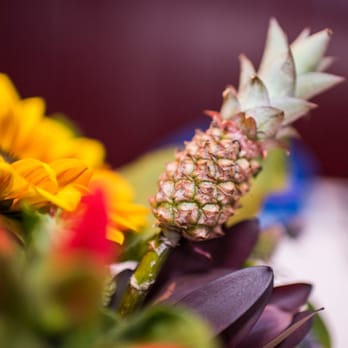 Haute Blossoms Floral - Mini pineapples were my favorite part of the floral centerpieces! So original and perfect for a wedding reception! Photo by Willa Kveta. - Florists Near Me Haute Blossoms Floral - Mini pineapples were my favorite part of the floral centerpieces! So original and perfect for a wedding reception! Photo by Willa Kveta. - Florists Near Me