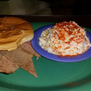 Rivertowne BBQ - Beef brisket sandwich with a side of coleslaw.. - Barbeque Near Me - Ozark, Arkansas Rivertowne BBQ - Beef brisket sandwich with a side of coleslaw.. - Barbeque Near Me - Ozark, Arkansas