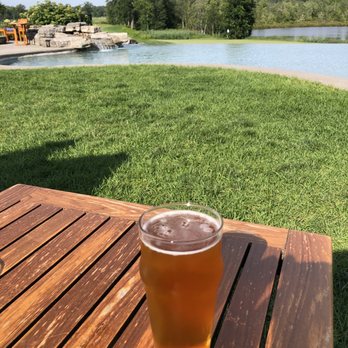 Heritage - Sitting on the lawn and enjoying a beer and a view. - New American Near Me - Saratoga Springs, New York