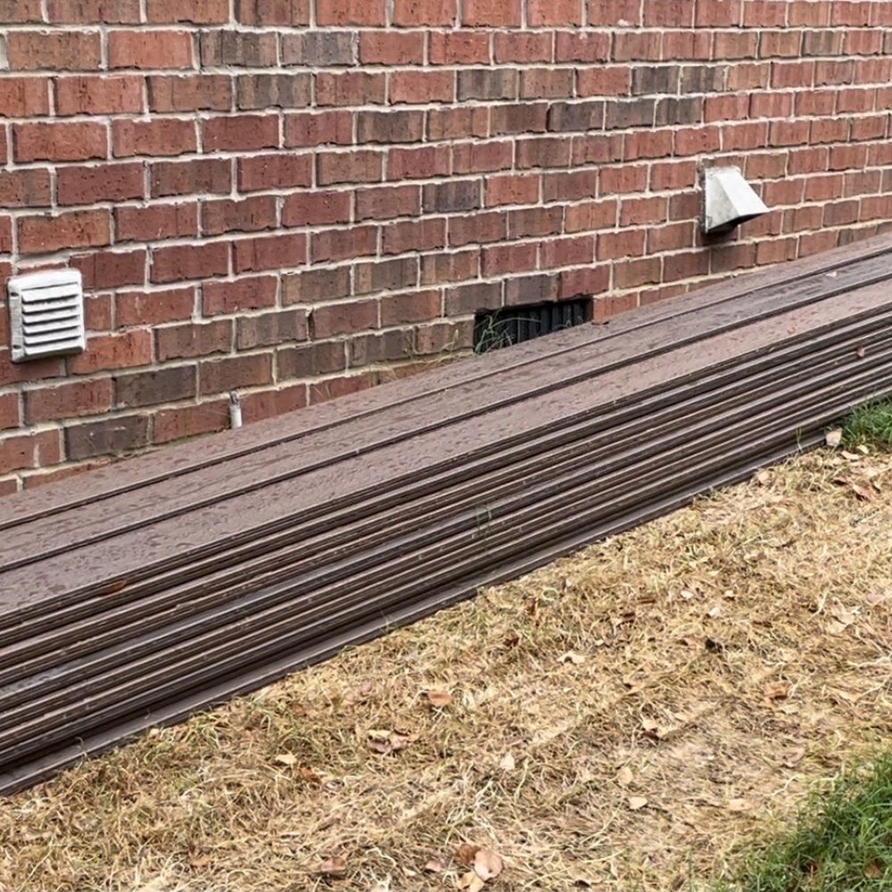 Structure Group - Dead grass from material left in middle of yard for over a month. We stacked against wall. - Decks & Railing Near Me - Mt. Juliet, Tennessee