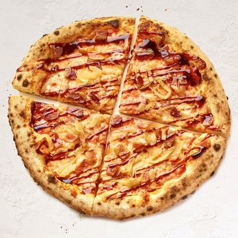 Wegmans Meals 2GO - a pizza with sauce on it - Food Delivery Services Near Me - Tysons, Virginia Wegmans Meals 2GO - a pizza with sauce on it - Food Delivery Services Near Me - Tysons, Virginia