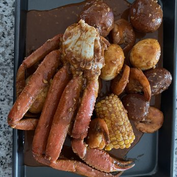 Crackin Crawfish - Takeout: 1/2 LB. Combo- Pick 2 with snow crab and shrimp head-off deveined - Cajun/Creole Near Me - Charlotte, North Carolina