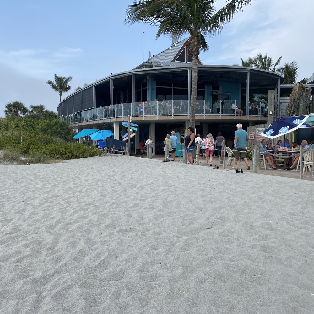 Fins At Sharky's - View of Fins from the beach - Steakhouses Near Me - Venice, Florida Fins At Sharky's - View of Fins from the beach - Steakhouses Near Me - Venice, Florida