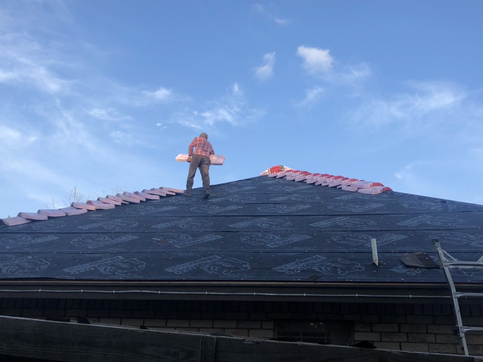 Slide of Roof Improvement