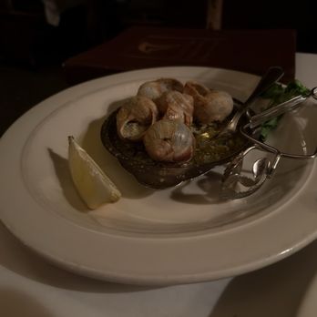 Tornado Steak House - Escargots - pro tip... use the bread to soak up the butter - Steakhouses Near Me - Madison, Wisconsin