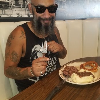 Bob's Big Boy Broiler - The hubby with his steak asn mash potatoes with onion rings... - American Near Me - Downey, California
