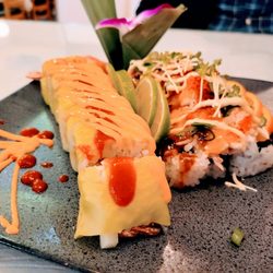 Tangerine Japanese Cuisine - Pizza roll and Symrna roll. My hubby says the pizza is his new go-to!