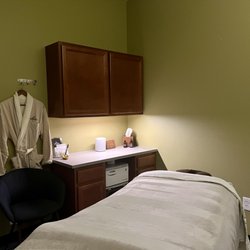 Serasana - Our low-lit treatment rooms are where your massage, acupuncture and other sessions take place for your relaxation.