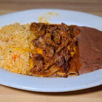 Cancun Mexican Restaurant - Beef enchiladas with beef fajita meat on top. Special order - Mexican Near Me - Fort Worth, Texas Cancun Mexican Restaurant - Beef enchiladas with beef fajita meat on top. Special order - Mexican Near Me - Fort Worth, Texas