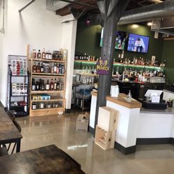 Full-liquor bar where guests can watch what they like (such as sports) on two TVs while seated at the bar.