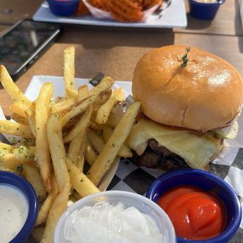 Joe's Farm Grill - Gouda Garlic Bacon Burger Stack and Fontina Burger with Sweet Potato Fries and Garlic Fries - American Near Me - Gilbert, Arizona Joe's Farm Grill - Gouda Garlic Bacon Burger Stack and Fontina Burger with Sweet Potato Fries and Garlic Fries - American Near Me - Gilbert, Arizona