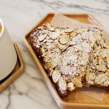 Small Victory Bakery - Cappuccino and almond croissant - Coffee & Tea Near Me - Vancouver, British Columbia Small Victory Bakery - Cappuccino and almond croissant - Coffee & Tea Near Me - Vancouver, British Columbia